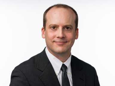 A headshot of Gregory Brazeal.