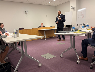 Rodney Axson Jr., USD Knudson School of Law student, presenting at the National Military Justice Competition.