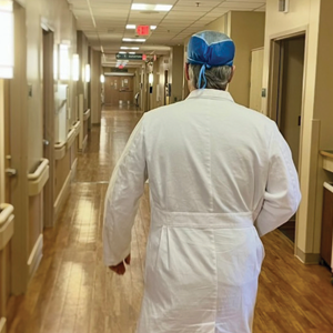 Dr. Brandt Becker walks down a hallway in Pierre, South Dakota at Avera St Mary’s Hospital.