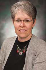 A headshot of Janet Fulk.