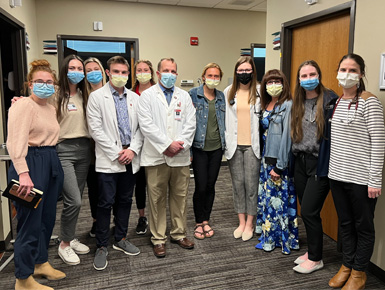 USD Community Clinic staff and students pose together for a photo.