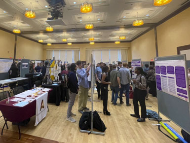 NCUR students presenting at conference