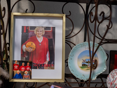 Another close up of the photos on McCahren's shelf, which includes a cover photo of her on the the "Empire Lifestyle" magazine.