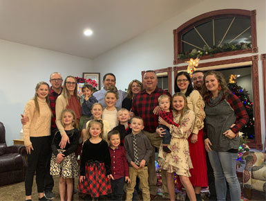 Wayne Kindle at a family gathering with his children and grandchildren during the holidays.