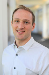 A portrait of Tim Skog.