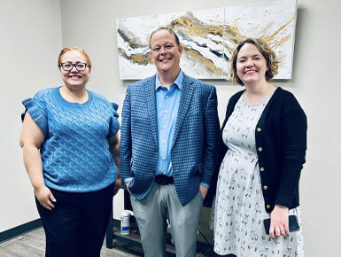 Collaborators of the SDHCC and USD – Sioux Falls stand together and pose for a picture.
