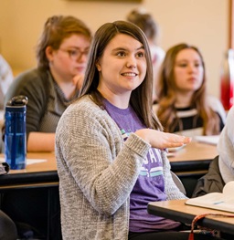 Students in a classroom sitting at desks