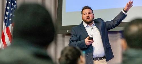 A Graduate student presenting his three minute thesis.