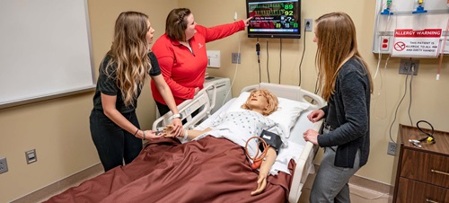 Health Science Students Inside a Patient Simulation Room