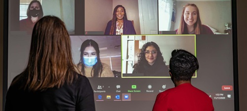 Group of Females on Video Chat Having a Discussion.