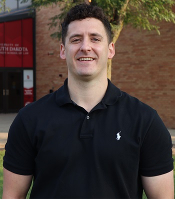 Success story Brendan Goetzinger smiling,